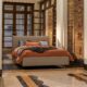 The Egon bed, a classic bed with a comfortable padded headboard.