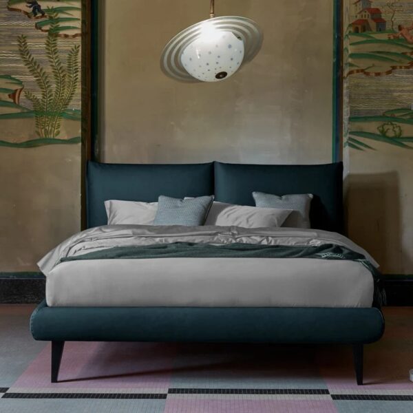 The Frank bed, a minimalist bed frame with clean lines and a modern design.