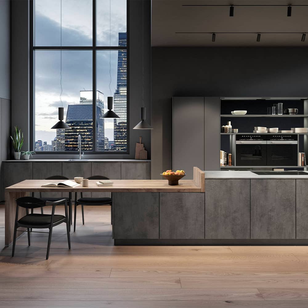 Luxury Riva 889 kitchen in dark stone decor featuring a wooden dining table extension and stunning city views.