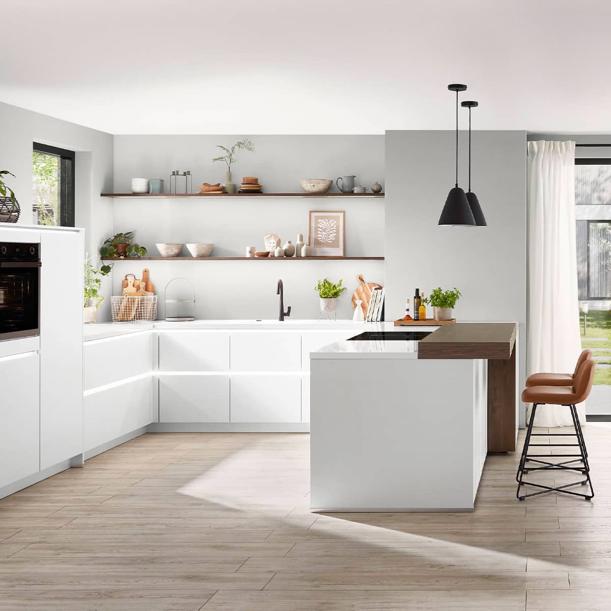 Senso Kitchen 490 - White kitchen with bench All-white handleless U-shaped kitchen featuring floating wooden shelves and a dark wood breakfast bar extension.