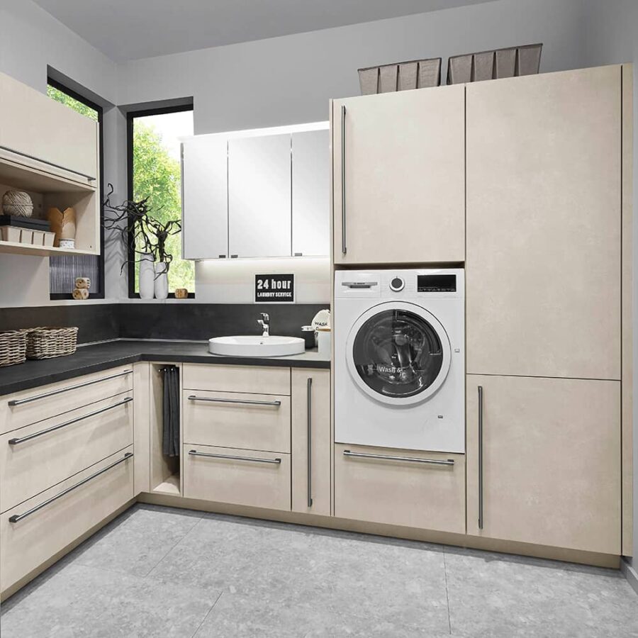 Beige Laundry room with dark work top and handles
