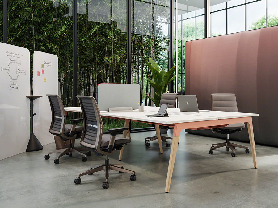 A spacious open office environment with modern desk benching and workstation solutions, ideal for collaborative workspaces and productive environments.