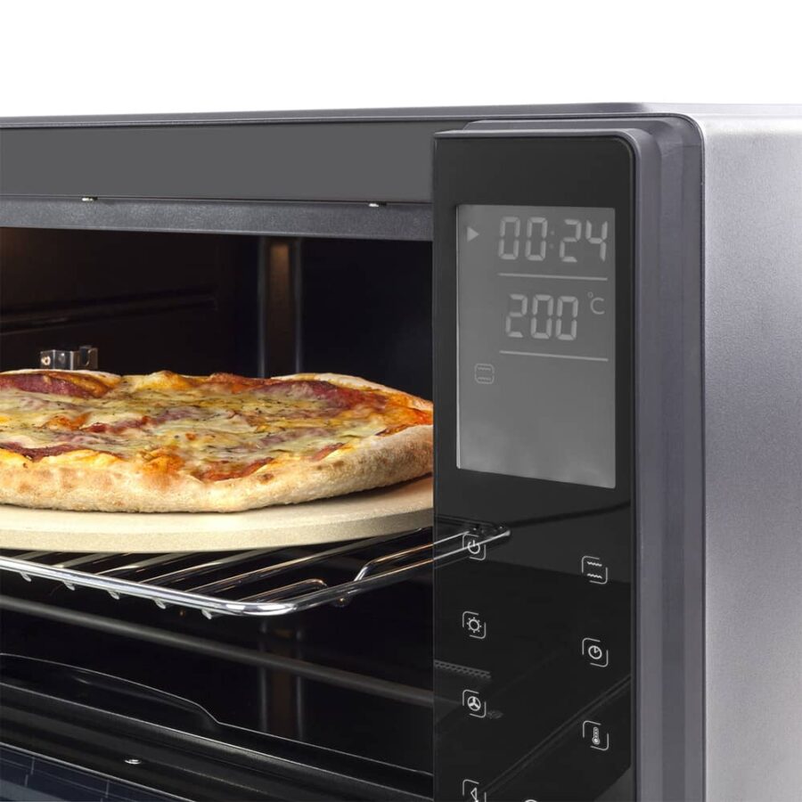 Close-up of countertop oven display, control buttons, and pizza baking on pizza stone on wire rack