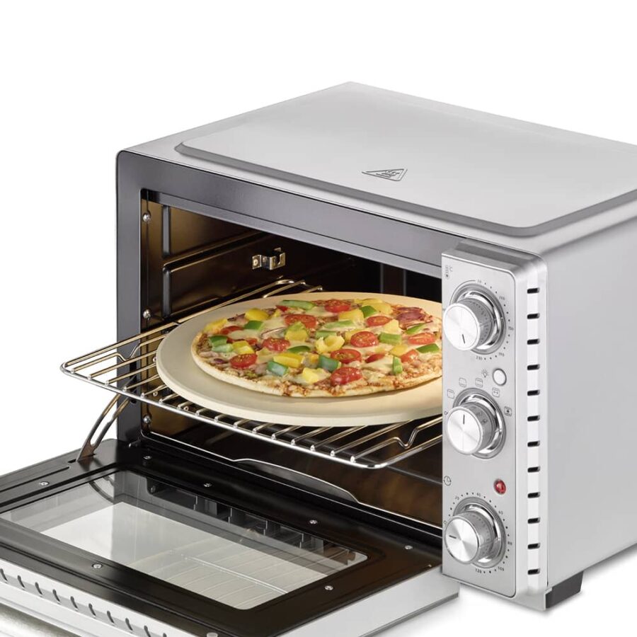 CASO TO 26 SilverStyle oven with door open, light on, pizza on pizza stone on wire rack slightly pulled out.
