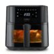 Frontal view of Caso AirFry 6.0 on white background with LED display on, interior light showing whole chicken cooking inside