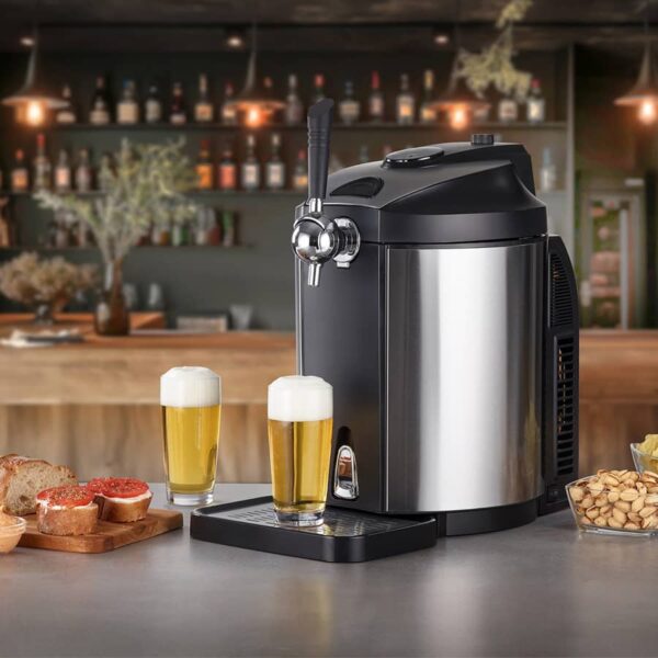 Caso Beer Master Dispenser with two glasses of beer in bar setting, blurred alcohol shelf background, bread and nuts in front.