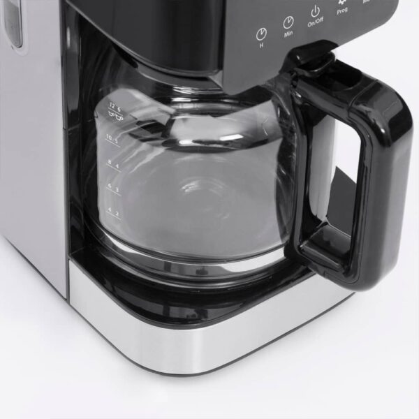 Close-up of empty coffee jug from Caso Coffee Taste & Style, clear glass jug with handle and spout.