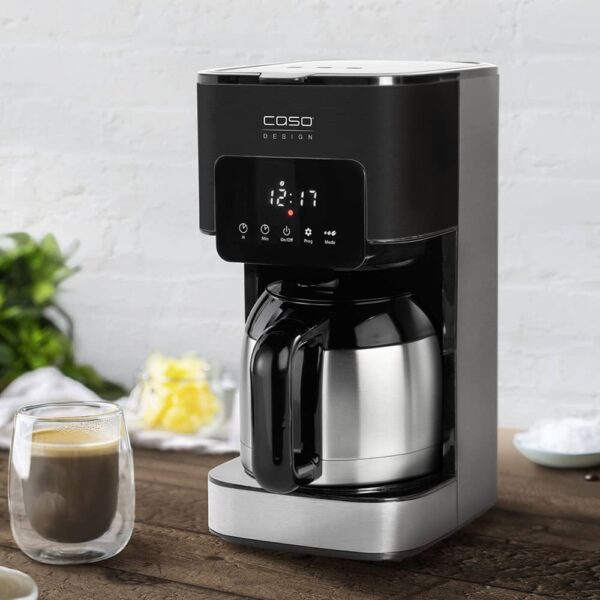 Compact filter coffee maker with insulated jug, aroma control, and programmable timer