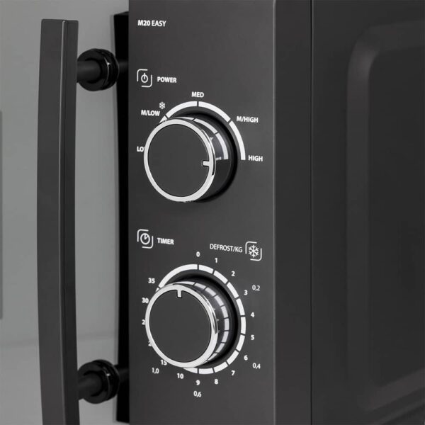Close-up of Caso Microwave M 20 Easy control dials showing power settings from low to high and timer dial.