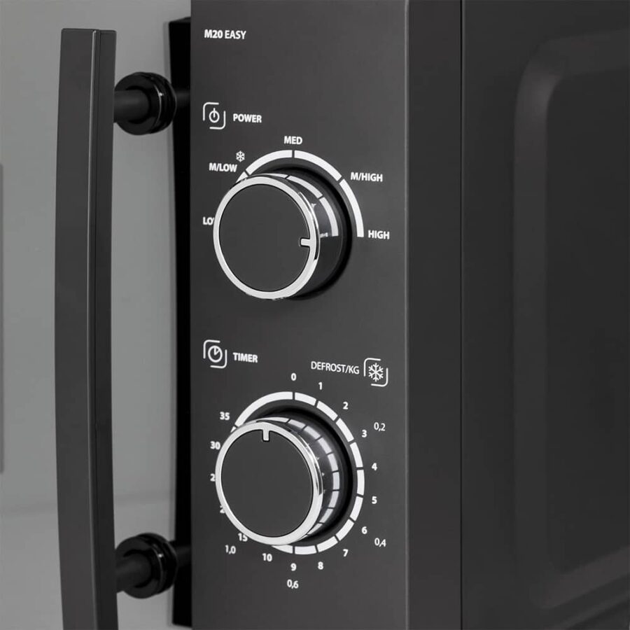 Close-up of Caso Microwave M 20 Easy control dials showing power settings from low to high and timer dial.