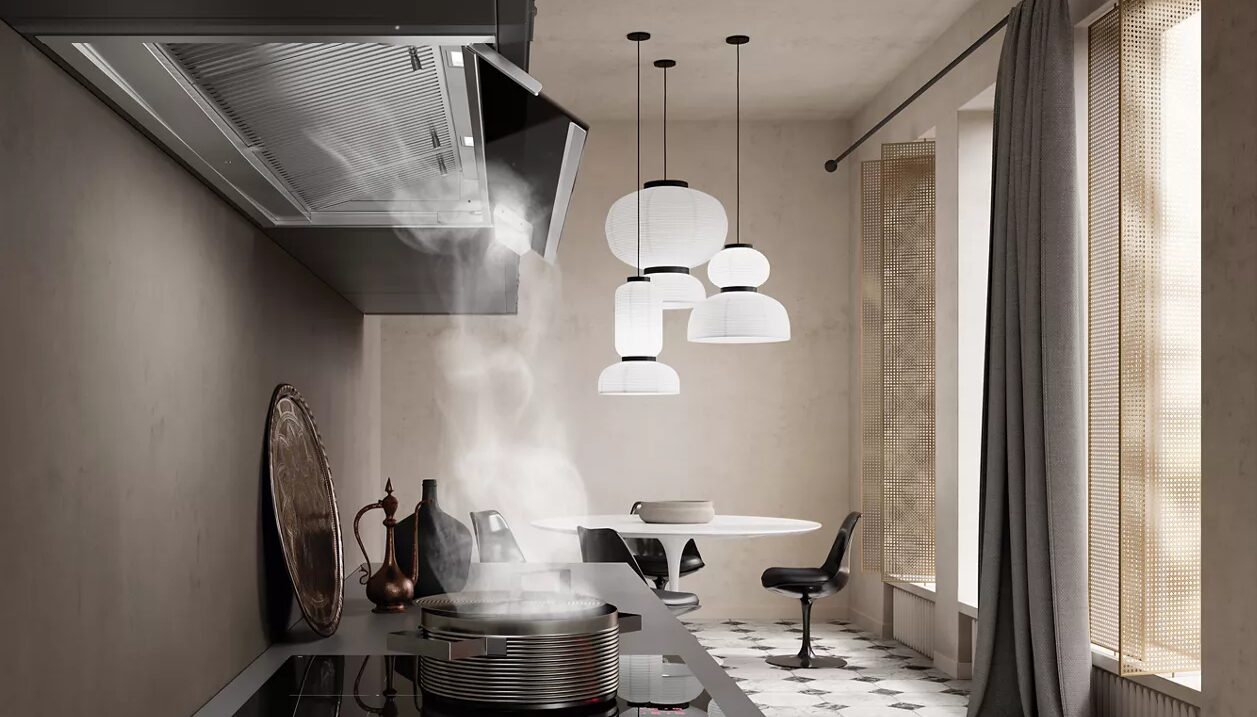 Steam rising from a cooking pot and being drawn into a Faber InNova kitchen hood.