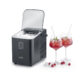 Caso IceChef Compact on white background with open lid showing ice cubes, two glasses with red drink, mint, raspberries.