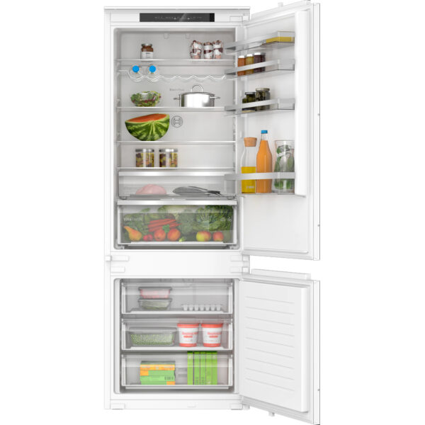 Bosch KBN96VSE0 built-in fridge-freezer open, showing shelves with fruits, vegetables, drinks and frozen food.
