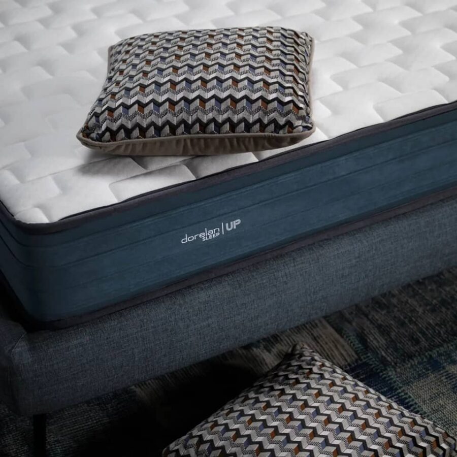 Close-up of Dorelan Mattress with cushion on top.