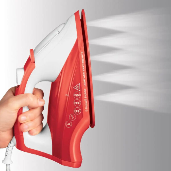 Red and white steam iron with vapor coming out.