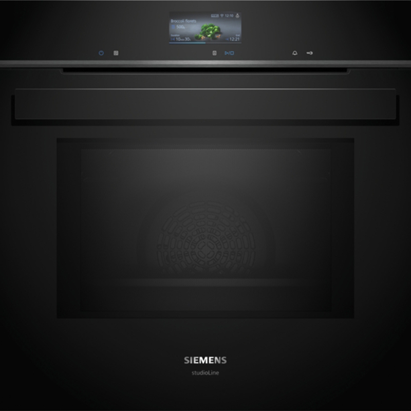 Front view of Siemens HM976GMB1 built-in oven featuring black glass door, microwave function and digital control panel